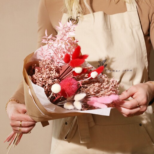 Vibrant Valentine's Dried Flower Bouquet Being Held by Model 