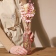 Model Holding Vintage Valentine's Dried Flower Posy with Vase