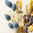 Close Up of Florals From Yellow and Blue Dried Flower Posy