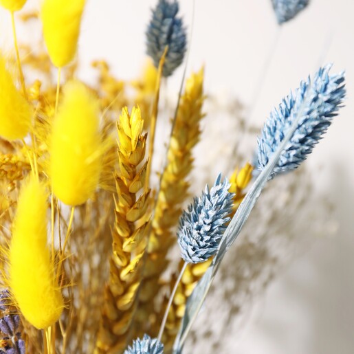 Close Up of Wheat and Bunny Tails in the Yellow and Blue Dried Flowers Letterbox Gift
