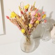 Yellow and Pink Dried Flower Bouquet Arranged Inside Glass Vase