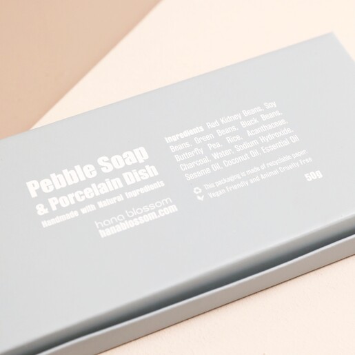 Back of Packaging Back of Hana Blossom Wellness Pebble Soaps Box on Neutral Background