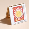 The Sun Tarot Card Compact Mirror on Neutral Background