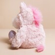 Back view of the Warmies 9” Junior Sparkly Pink Unicorn Soft Toy