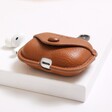 Personalised AirPods Pro Soft Vegan Leather Case in Tan on white surface with AirPods