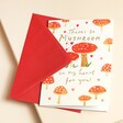 So Mushroom In My Heart Valentine's Day Card laying on beige backdrop with red envelope
