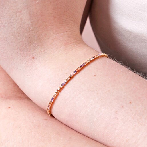 Bracelet on Model Close Up of Model Wearing Pastel Baguette Crystal Bracelet in Gold