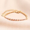 Pastel Baguette Crystal Bracelet in Gold on beige Fabric