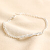 Crystal and Pearl Bar Bracelet in Silver on Beige Fabric