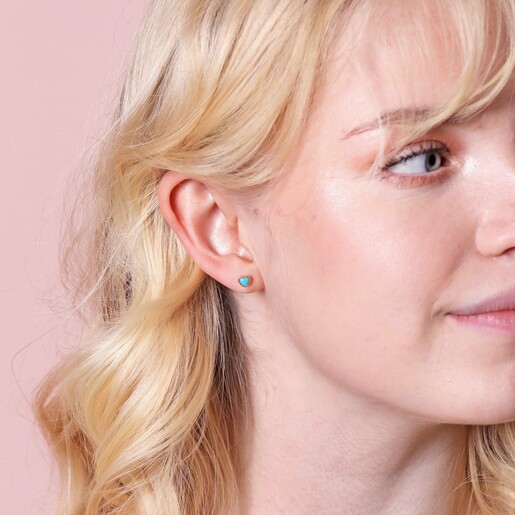 Blue Stone Heart Stud Earrings in Gold on Model