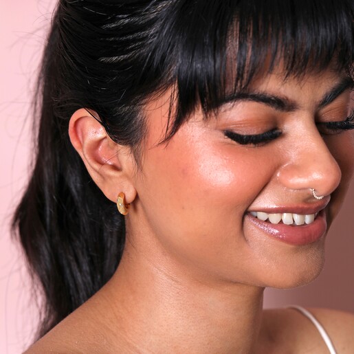 Earrings on Model Small Crystal Hammered Half Hoop Earrings in Gold on Model