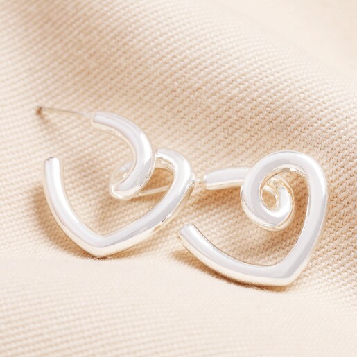 Large Scribble Heart Hoop Earrings in Silver Large Scribble Heart Hoop Earrings in Silver on Beige Fabric