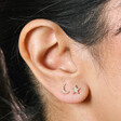 Lisa Angel Ladies' Moon and Star Crystal Stud Earrings in Gold Close Up on Model