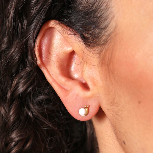 Earrings on Model Close Up of Opal Snail Stud Earrings in Gold on Model