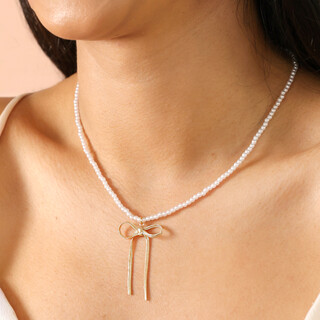 Pearl Necklace with Large Bow Pendant in Gold