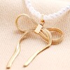 Pearl Necklace with Large Bow Pendant in Gold Bow Close Up