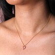 Close Up of Pink Faceted Crystal Heart Pendant Necklace in Gold on Model
