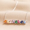 Rainbow Crystal Baguette Bar Necklace in Silver on Beige Fabric