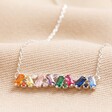 Rainbow Crystal Baguette Bar Necklace in Silver on Beige Fabric