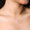 Close Up of Hammered Circle Pendant Necklace in Silver on Model