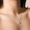 Close up of Sunbeam Heart Pendant Necklace in Silver on model