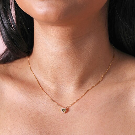 Tiny Green Crystal Heart Pendant Necklace in Gold on model