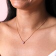 Close Up of Tiny Pink Crystal Heart Pendant Necklace in Gold on Model