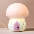 Fairy Toadstool LED Night Light Lit on Beige Surface
