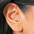 Close Up Model Shot of Tish Lyon Solid White Gold Crystal Crescent Moon Helix Earring