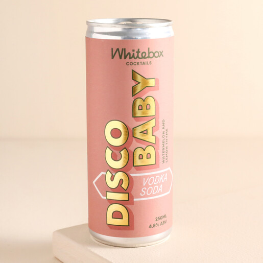 250ml Can of Whitebox Cocktails Disco Baby Vodka Soda against beige background