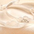 Close up of personalisations on Personalised Sterling Silver Cloud Christening Bangle