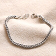 Men's Sterling Silver Foxtail Chain Bracelet on top of neutral coloured fabric