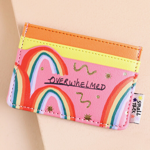 House of Disaster Small Talk Overwhelmed Rainbow Card Holder with yellow and orange side against beige background