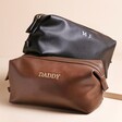 Personalised Men's Vegan Leather Wash bags in Bothe Colours on Beige Surface 