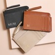 Personalised Vegan Leather Card Holders in black, beige and tan on top of beige coloured backdrop