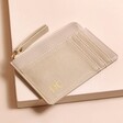 Personalised Vegan Leather Card Holder in beige on top of neutral coloured backdrop