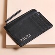 Personalised Vegan Leather Card Holder in black on top of beige coloured background