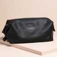 Personalised Father's Day Vegan Leather Wash Bag in black against neutral background