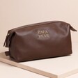 Personalised Father's Day Vegan Leather Wash Bag in brown against beige backdrop