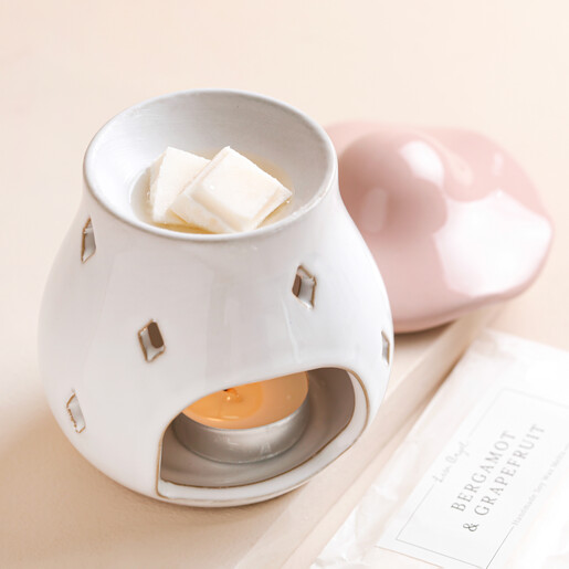 Bergamot and Grapefruit Soy Wax Melts in Burner Bergamot and Grapefruit Soy Wax Melts in a wax burner