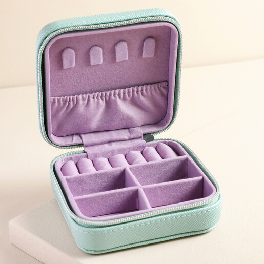 Open Estella Bartlett Square Jewellery Case in Mint Green on Beige Surface