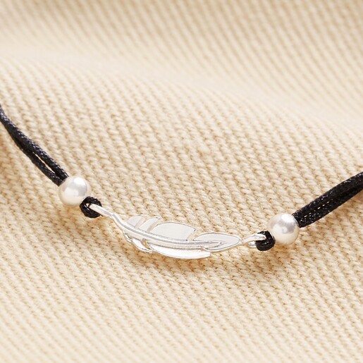 Close Up of Charm on Sterling Silver Feather Cord Bracelet 