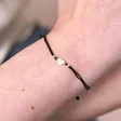 Close Up of Sterling Silver Heart Cord Bracelet 