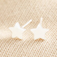 Sterling Silver Puffed Star Stud Earrings on top of beige coloured fabric