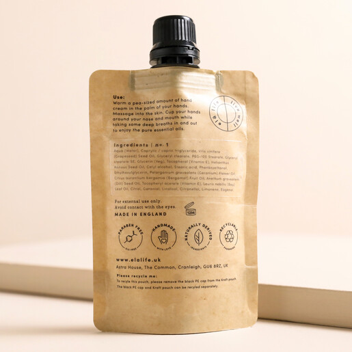 Back of Elä Life Begin No. 1 Vitamin E Hand Cream package in front of neutral backdrop