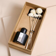 Elä Life Nurture No. 2 Pom Pom Flower Diffuser in gift box against beige backdrop