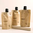 Elä Life Begin No. 1 Vitamin E Hand Cream with other hand creams against beige backdrop