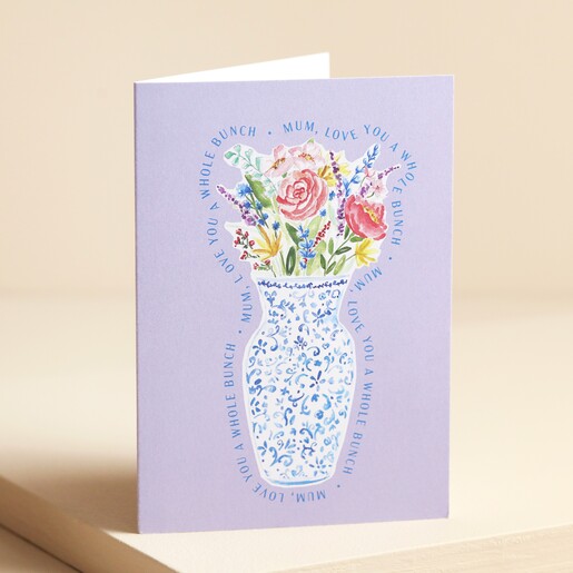 Mum Bouquet Purple Mother's Day Card standing in front of beige backdrop