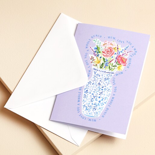 Mum Bouquet Purple Mother's Day Card with envelope on top of beige background