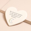 Favourite Person Cream Ceramic Heart Coaster against raised beige surface